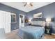 Bedroom features a large bed, nightstands, closet and doorway to the bathroom at 1298 River Oaks Dr. # 5-I, Myrtle Beach, SC 29579