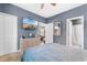 Comfortable bedroom featuring a dresser, television and attached bathroom at 1298 River Oaks Dr. # 5-I, Myrtle Beach, SC 29579