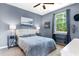 Comfortable bedroom with large window for natural light and furniture at 1298 River Oaks Dr. # 5-I, Myrtle Beach, SC 29579