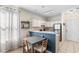 Bright dining area showcasing a table with four chairs and convenient access to the kitchen at 1298 River Oaks Dr. # 5-I, Myrtle Beach, SC 29579