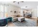 Open living room flows to kitchen/dining area and features lots of natural light and comfortable seating at 1298 River Oaks Dr. # 5-I, Myrtle Beach, SC 29579