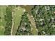 Aerial view of a community on a golf course featuring lush greenery and ponds at 159-1 Weehawka Way # 159-1, Pawleys Island, SC 29585