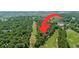Aerial view of a home on a golf course featuring lush greenery and marshland at 159-1 Weehawka Way # 159-1, Pawleys Island, SC 29585