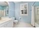Bright bathroom with a sink, mirror, and bath tub at 159-1 Weehawka Way # 159-1, Pawleys Island, SC 29585