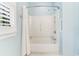Bathroom featuring a white tiled tub with a shower curtain at 159-1 Weehawka Way # 159-1, Pawleys Island, SC 29585