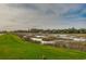 Scenic view of marsh landscape with homes in the distance at 159-1 Weehawka Way # 159-1, Pawleys Island, SC 29585