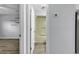 Bathroom doorway leading to a bathroom with a tub and shower combo at 1600 Deer Creek Rd. # F, Myrtle Beach, SC 29575