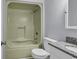 Bathroom with a tub and shower combo, granite countertop vanity, and a toilet at 1600 Deer Creek Rd. # F, Myrtle Beach, SC 29575