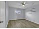 Bright bedroom featuring a ceiling fan, light blue walls and neutral flooring at 1600 Deer Creek Rd. # F, Myrtle Beach, SC 29575