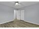 A neutral bedroom featuring a ceiling fan, closet and neutral flooring at 1600 Deer Creek Rd. # F, Myrtle Beach, SC 29575
