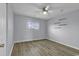 Neutral primary bedroom features a ceiling fan and a window at 1600 Deer Creek Rd. # F, Myrtle Beach, SC 29575