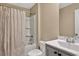 Neutral bathroom featuring a shower and bathtub combination with coordinating vanity and tile at 1631 Hepburn Dr., Little River, SC 29566