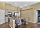Modern kitchen featuring an island with seating, stainless steel appliances, and attractive cabinets at 1631 Hepburn Dr., Little River, SC 29566