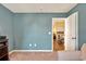 View from the living room into the kitchen and bar seating at 1631 Hepburn Dr., Little River, SC 29566