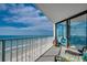 Balcony with seating and ocean view at 1990 N Waccamaw Dr. # 1008, Murrells Inlet, SC 29576