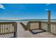 This is a deck providing access to the beach and an outdoor shower at 1990 N Waccamaw Dr. # 1008, Murrells Inlet, SC 29576