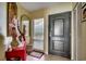 Inviting entryway features a closet, stylish decor, and a modern front door enhancing the home's appeal at 1990 N Waccamaw Dr. # 1008, Murrells Inlet, SC 29576