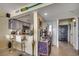 Bright kitchen with granite countertops, stainless steel appliances, and a breakfast bar at 1990 N Waccamaw Dr. # 1008, Murrells Inlet, SC 29576