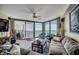 Inviting living room offering ocean views, balcony access, and comfortable seating arrangements at 1990 N Waccamaw Dr. # 1008, Murrells Inlet, SC 29576
