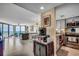 Open-concept living area with ocean view, tile flooring, and modern kitchen creating a luxurious ambiance at 1990 N Waccamaw Dr. # 1008, Murrells Inlet, SC 29576