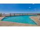The image shows an outdoor swimming pool overlooking the ocean at 1990 N Waccamaw Dr. # 1008, Murrells Inlet, SC 29576