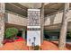 Sign identifying the One Ocean Place condo complex and the address at 1990 N Waccamaw Dr. # 1008, Murrells Inlet, SC 29576