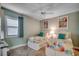 Charming bedroom with two twin beds, colorful seashell-themed bedding, and coastal-inspired decor at 1990 N Waccamaw Dr. # 807, Murrells Inlet, SC 29576