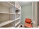 Walk-in closet with white shelving providing great storage at 1990 N Waccamaw Dr. # 807, Murrells Inlet, SC 29576