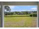 Picturesque backyard view features a pond and well-maintained landscaping in a tranquil setting at 2004 Potomac Ct., Myrtle Beach, SC 29579