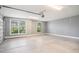Spacious garage with bright lighting and windows offers ample room for vehicles and storage at 2004 Potomac Ct., Myrtle Beach, SC 29579