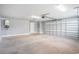 Clean garage with bright lighting and opener offers ample room for vehicles and storage at 2004 Potomac Ct., Myrtle Beach, SC 29579