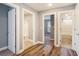 Hallway showing multiple doorways to different rooms featuring hard wood and carpeted floors at 2004 Potomac Ct., Myrtle Beach, SC 29579
