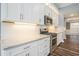 Kitchen featuring granite countertops, subway tile backsplash, and stainless steel appliances at 2004 Potomac Ct., Myrtle Beach, SC 29579
