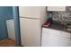 Bright kitchen features white appliances, ample counter space, and tile backsplash at 2005 Greens Blvd. # C-204, Myrtle Beach, SC 29577