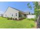 Backyard with a privacy fence and manicured landscaping at 2020 Willow Run Dr. # D, Little River, SC 29566