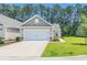 Charming single-Gathering home featuring an attached garage and well-manicured lawn in a desirable neighborhood at 2020 Willow Run Dr. # D, Little River, SC 29566