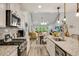 Modern kitchen seamlessly connects to the dining and living areas, perfect for entertaining and Gathering gatherings at 2020 Willow Run Dr. # D, Little River, SC 29566