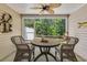 This screened porch offers a private view of the fenced backyard at 2020 Willow Run Dr. # D, Little River, SC 29566