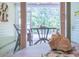 This charming screened porch has a lovely view and comfortable seating at 2020 Willow Run Dr. # D, Little River, SC 29566