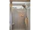 Clean and modern tiled shower with window and shower head; bathroom features neutral color scheme at 2020 Willow Run Dr. # D, Little River, SC 29566