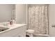 Bathroom featuring a vanity with a white countertop, a mirror, and a shower with decorative curtains at 212 Carolina Lakes Blvd., Myrtle Beach, SC 29588