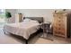 Bedroom with a gray headboard and dresser on each side of the bed at 212 Carolina Lakes Blvd., Myrtle Beach, SC 29588