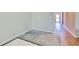 Neutral hallway with hardwood floors and a light-colored area rug at 212 Carolina Lakes Blvd., Myrtle Beach, SC 29588