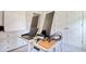 Home office featuring white walls, a long desk with monitors, and a chest of drawers at 212 Carolina Lakes Blvd., Myrtle Beach, SC 29588