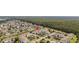 Picturesque aerial view of a sprawling complex with ponds, manicured lawns, and ample parking at 2265 Huntingdon Dr. # J, Surfside Beach, SC 29575