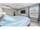 Comfortable bedroom features a ceiling fan, large dresser and a comfortable bed at 2265 Huntingdon Dr. # J, Surfside Beach, SC 29575