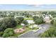 Aerial view showcasing a well-maintained community pool, playground, and surrounding green spaces at 2265 Huntingdon Dr. # J, Surfside Beach, SC 29575