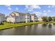 Well-maintained multi-Gathering residence with scenic pond and lush landscaping, enhancing curb appeal at 2265 Huntingdon Dr. # J, Surfside Beach, SC 29575