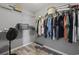 Bright walk-in closet with a rod for hanging clothes and white wire shelving for ample storage space at 2265 Huntingdon Dr. # J, Surfside Beach, SC 29575