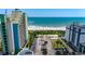Beautiful aerial view of beachfront condos, beach access, and parking areas between resort properties at 2309 Withers Dr. # 5, Myrtle Beach, SC 29577